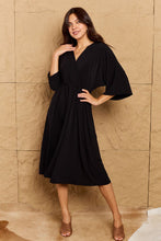 Load image into Gallery viewer, Make Your Move Solid Surplice Midi Dress