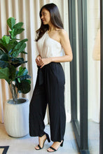 Load image into Gallery viewer, Marvelous in Manhattan One-Shoulder Jumpsuit in White/Black